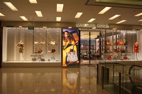 michael kors bonifacio high street|Michael Kors Refurbishes First Flagship Store In .